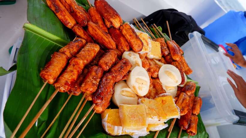 Bohol Virgin Island Sunset Tour - Snacks, fruit, and rum Coke at sunset