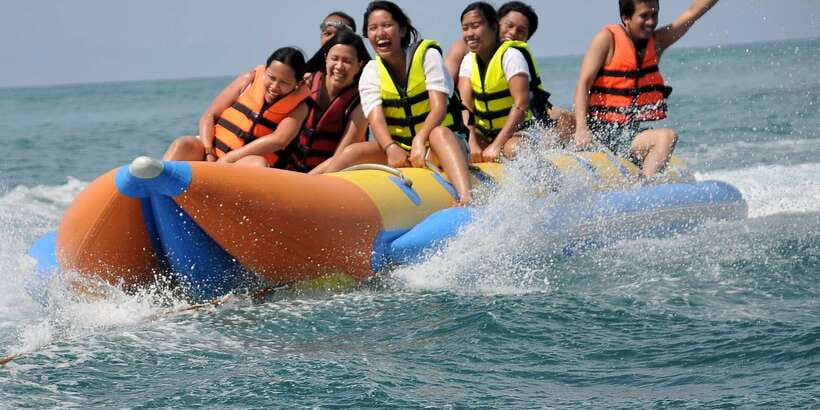 Boracay: Inflatable Banana or Dragon Boat Ride - Time at the floating water sports station