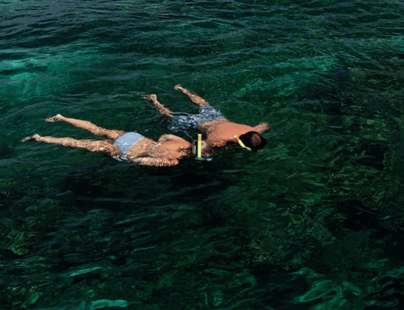 Boracay: Island Hopping with Lunch and Hot Kawa Bath - Puka Beach starts the day with sand and open water