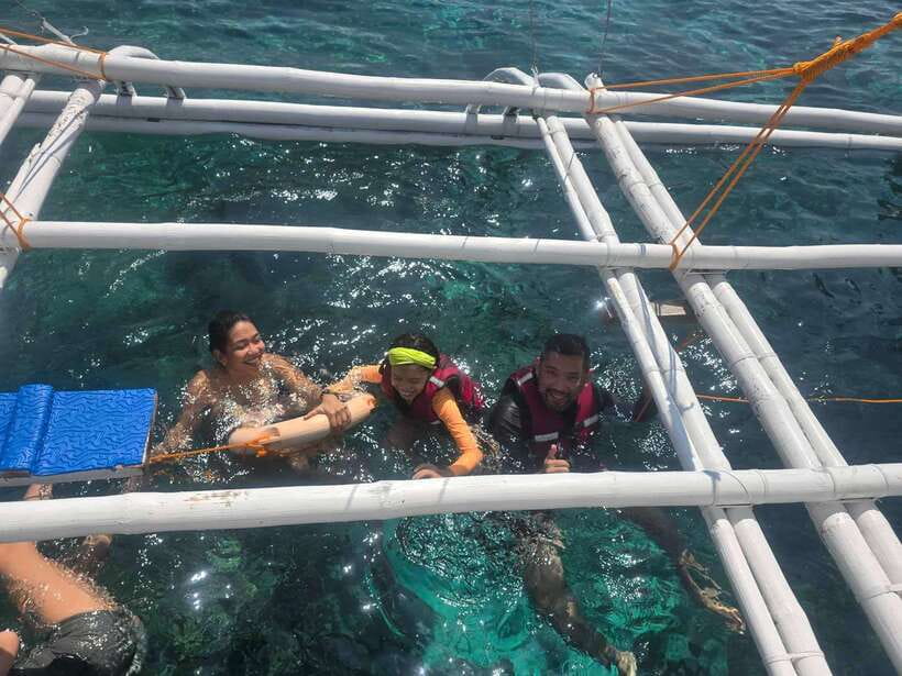 Cebu Island Hopping with Lunch - Nalusuan Island combines lunch, swimming, and a sandbar