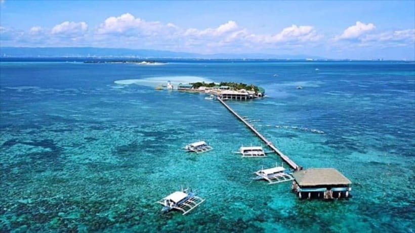 Cebu: Mactan Island Hopping Boat Tour with Lunch - Nalusuan Island for sandbar views and snorkeling