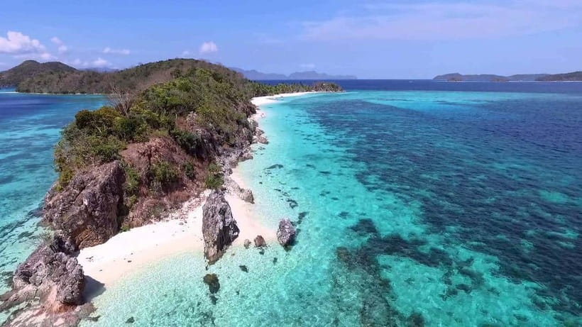 Coron: Coastal Cliffs, Beach & Malcapuya Island Hopping Tour - Malcapuya Island and Coron’s famous white sand