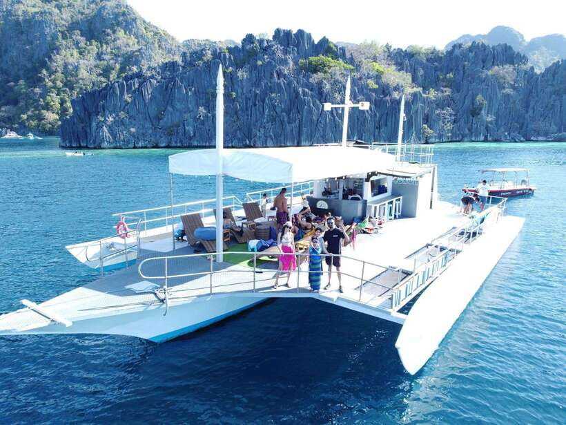 Coron Island: Premier Trimaran Tour - Banul Beach, snorkeling and lunch