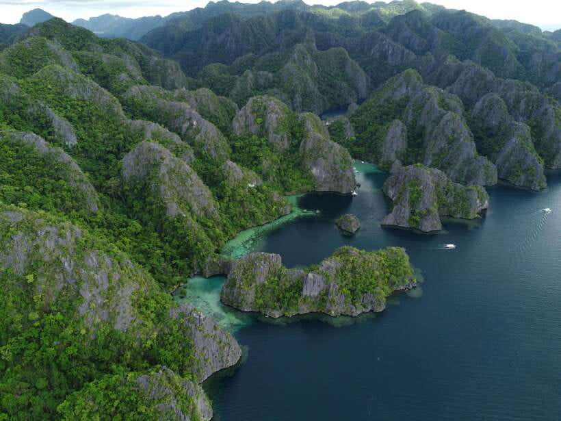 Coron: Island Tour B w/ Snorkeling & Lagoon Adventures - Twin Lagoon and the narrow passage between worlds