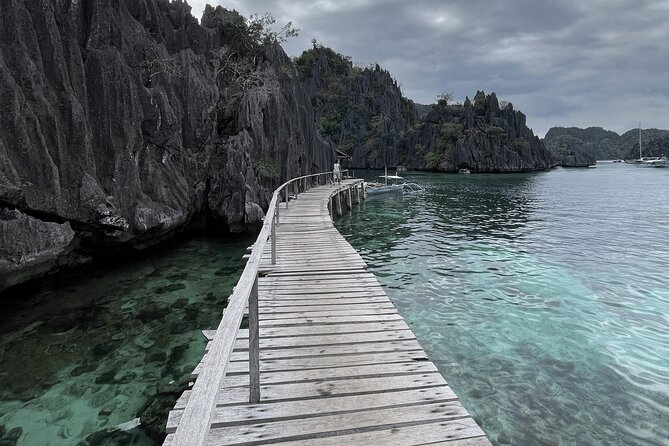 Coron Island Ultimate Tour: Private Boat and Tour Guide - Kayangan Lake begins with a climb