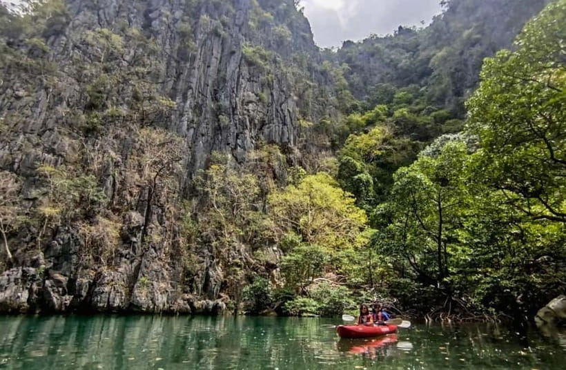Coron: North Face Kayaking Tour with Lunch and Snorkeling - Entering the turquoise lagoons by kayak