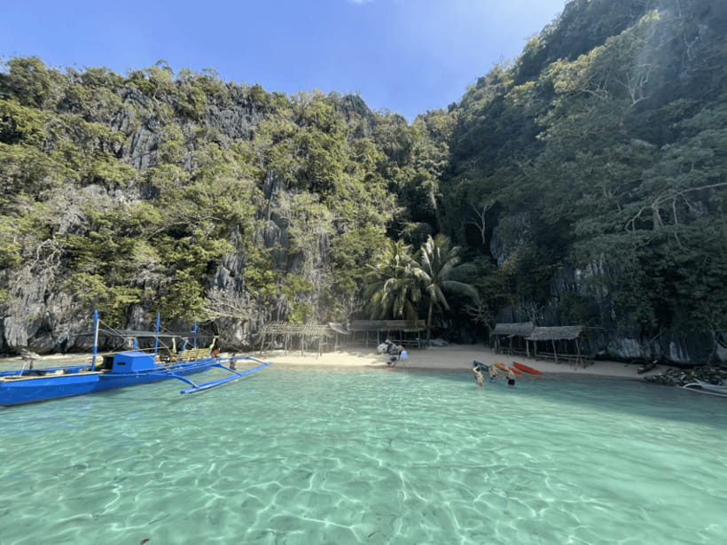 Coron: Private Boat Hire with Guided Tour and Lunch on Beach - Banol Beach, white sand, and the lunch break