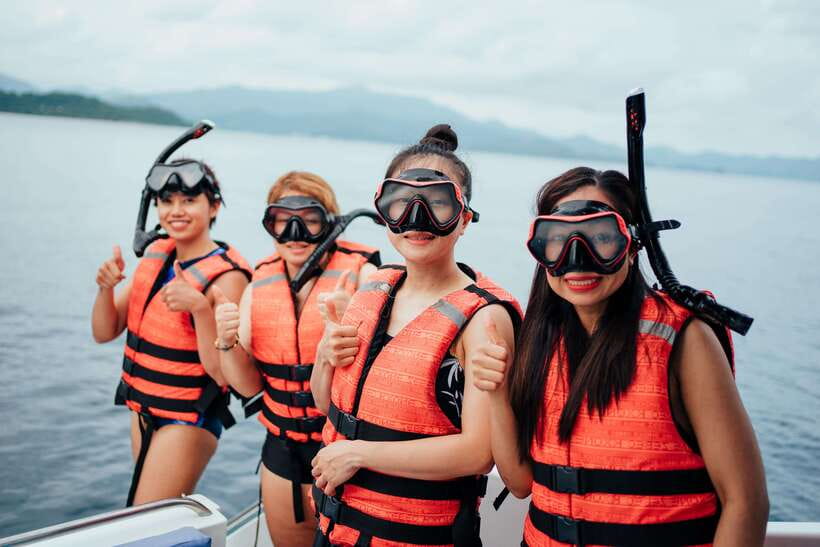Coron: Private Island-Hopping Tour on a Yacht or Speedboat - Twin Lagoon beneath the limestone cliffs