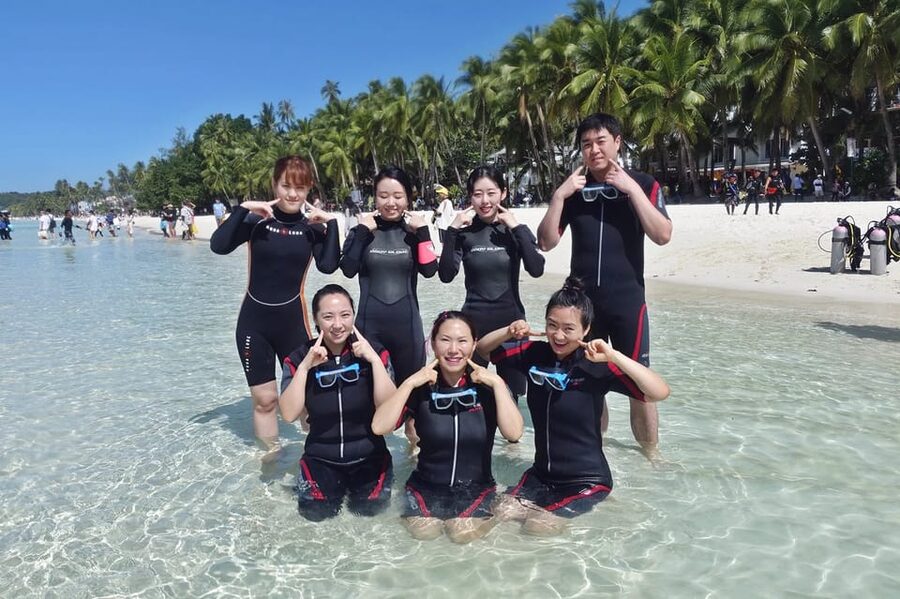 Discover Scuba Diving in Boracay - Entering the Water With a Guide Beside You