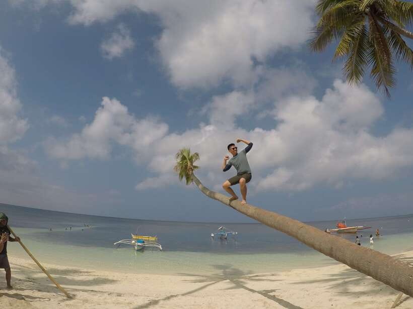 Dumaguete: Siquijor Island & Cambugahay Falls Private Tour - Enrique Villanueva and Maria on the coastal road