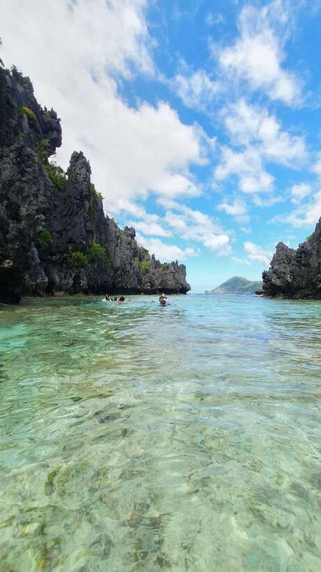 El Nido: Island Hopping and Snorkeling Private Boat Tour C - Secret Beach rewards the swim in