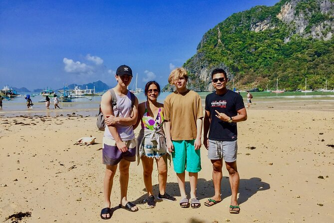 El Nido Tour A - Group w/ Buffet Lunch - Seven Commando Beach: palms, sand, and the busiest finish