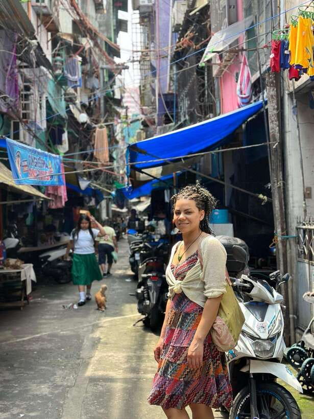 Explore Manila Slums and Hidden Market - Riding a tricycle through local streets