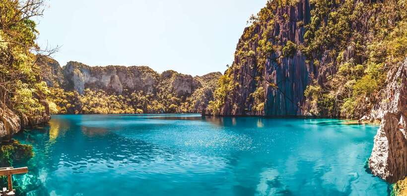 From Coron: Island Hopping Boat Day Trip with Buffet Lunch - Kayangan Lake and the climb to clear water