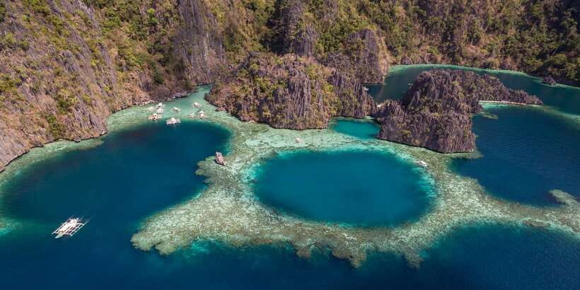 From Coron: Island Hopping Boat Day Trip with Buffet Lunch - Skeleton Wreck and Reef Garden underwater