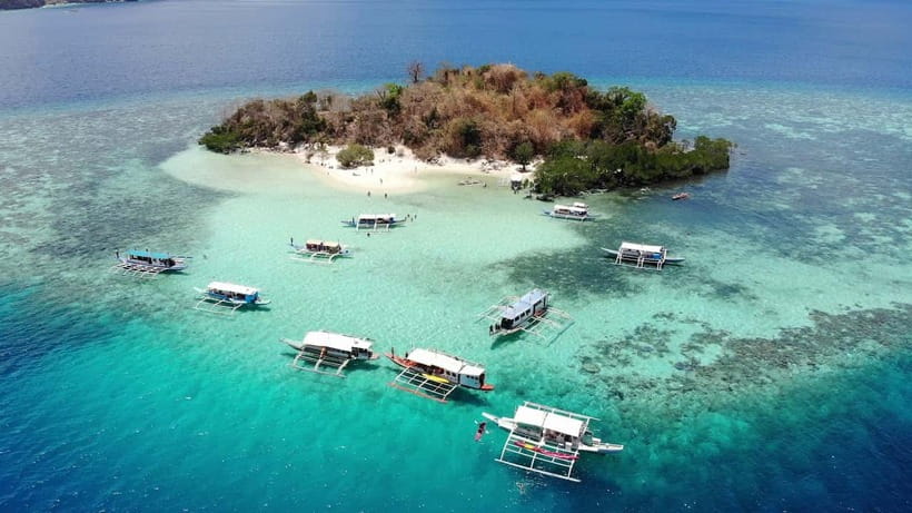 From Coron: Island Hopping Boat Day Trip with Buffet Lunch - Starting from Coron Town Proper