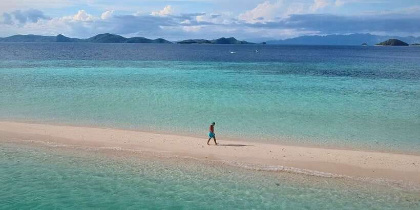 From Coron: Private Island-Hopping Cruise with Lunch - Lunch, swimming, and the pace of the day