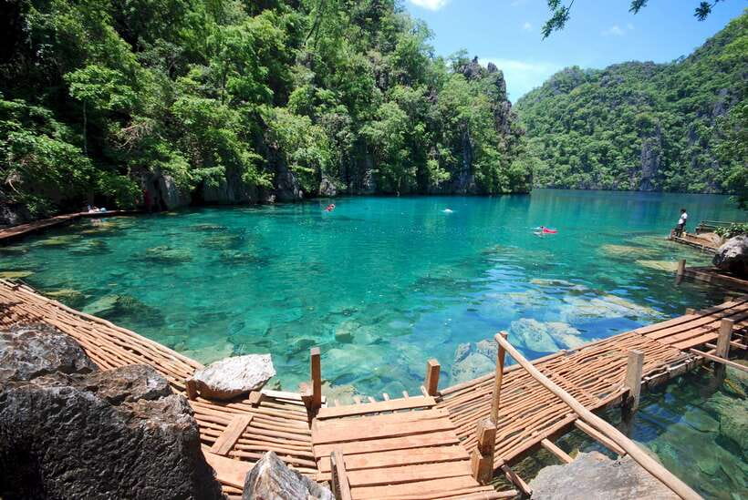 From Coron: Twin Lagoon and Skeleton Wreck Cruise with Lunch - Kayangan Lake adds a climb and a famous view