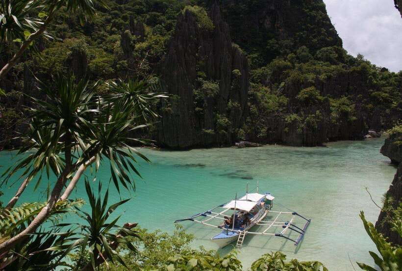 From El Nido: Island, Lagoons, and Beaches Boat Tour - Small Lagoon, two hours of calm water and rock walls