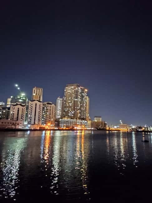 Manila: Enchanting Night Tour of Manila's Historic Landmarks - Manila’s lights from the road