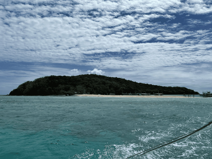 Private Boat for Culion Island Escapade Tour - Ditaytayan’s turquoise water and exposed sand