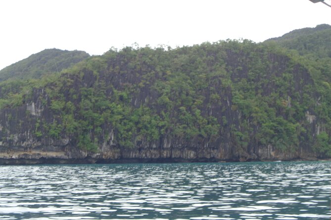 Puerto Princesa City Underground River Palawan UNESCO - Reaching Sabang by outrigger boat