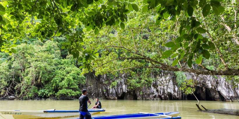 Puerto Princesa Underground River Tour in Palawan - Changing from van to boat at Sabang