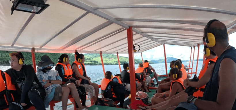Sohoton Cove: Swim with Jellyfish & Explore Hidden Lagoons - Tikitikan Island serves lunch with a social side