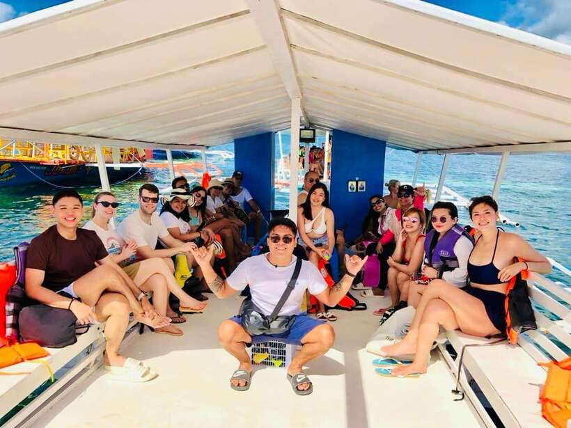 Tri island tour: Naked Island, Daku Island and Guyman Island - From General Luna to the open water